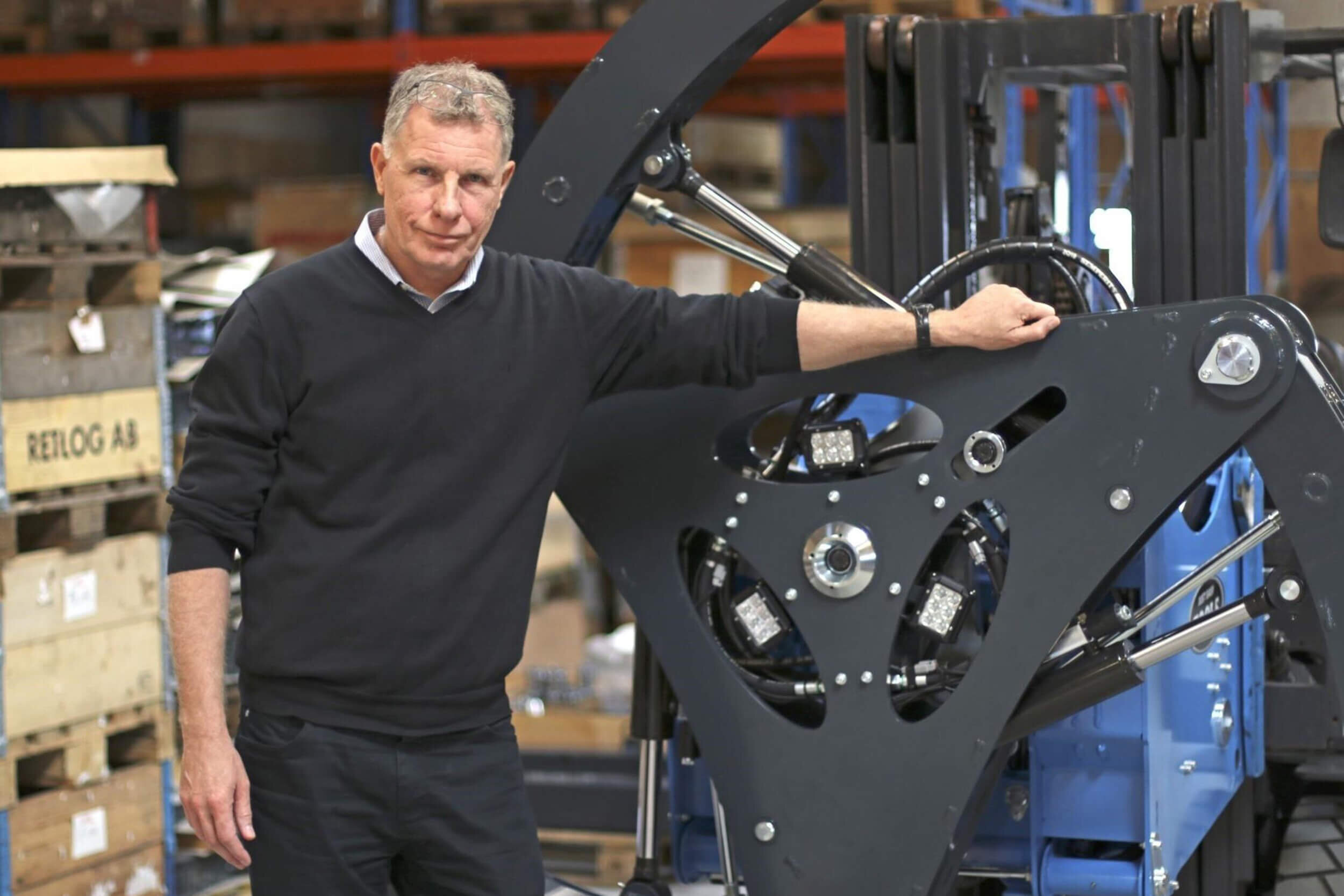 Owner Lars Jørgensen in front of the Easy Gripper handling tyres and wheels of up to two tons.