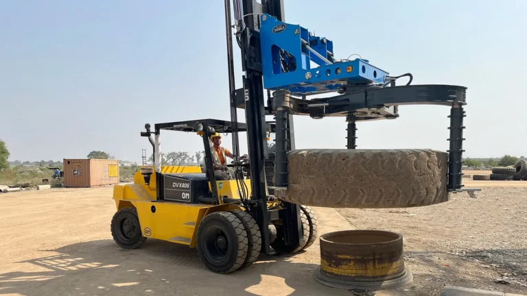 Handling large OTR tyre with safe and firm unique 3-point grip
